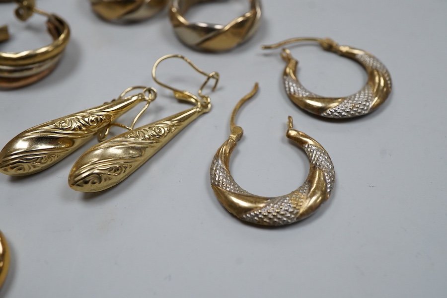 Nine pairs of earrings, comprising: seven hoop earrings, two of which set with pastes; and two pairs of drop earrings, six with British hallmarks for 9ct gold combined gross weight approximately 18 grams, three variously